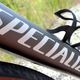 A photo of the Specialized logo on a bike frame.